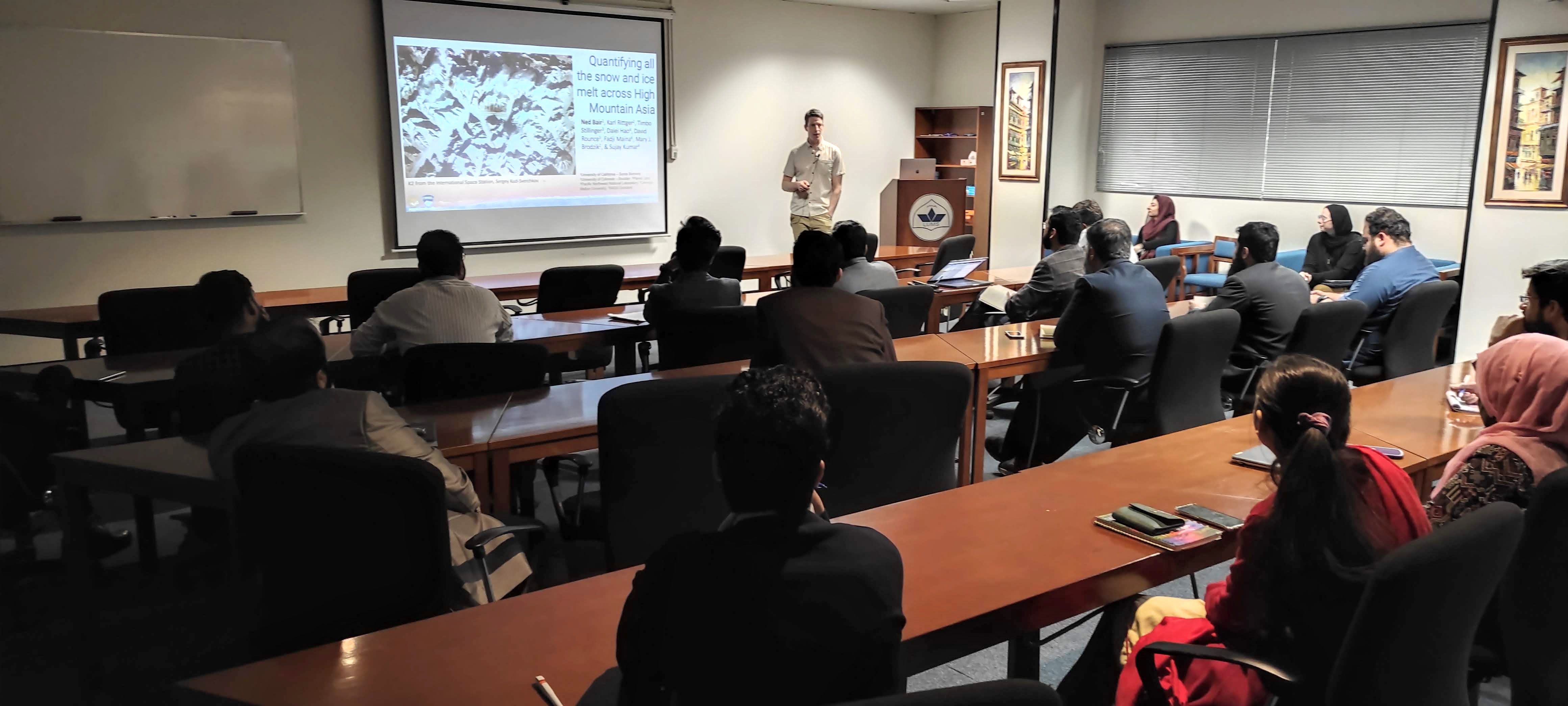 Dr. Ned giving talk at LUMS