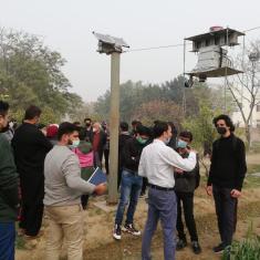 Cable driven robotic trolley for recording plant phenology 